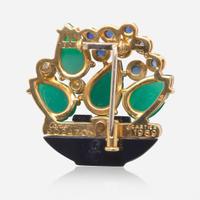 A Cartier Chrysophase, Sapphire, Diamond, and Onyx Pin Cartier c. 1989