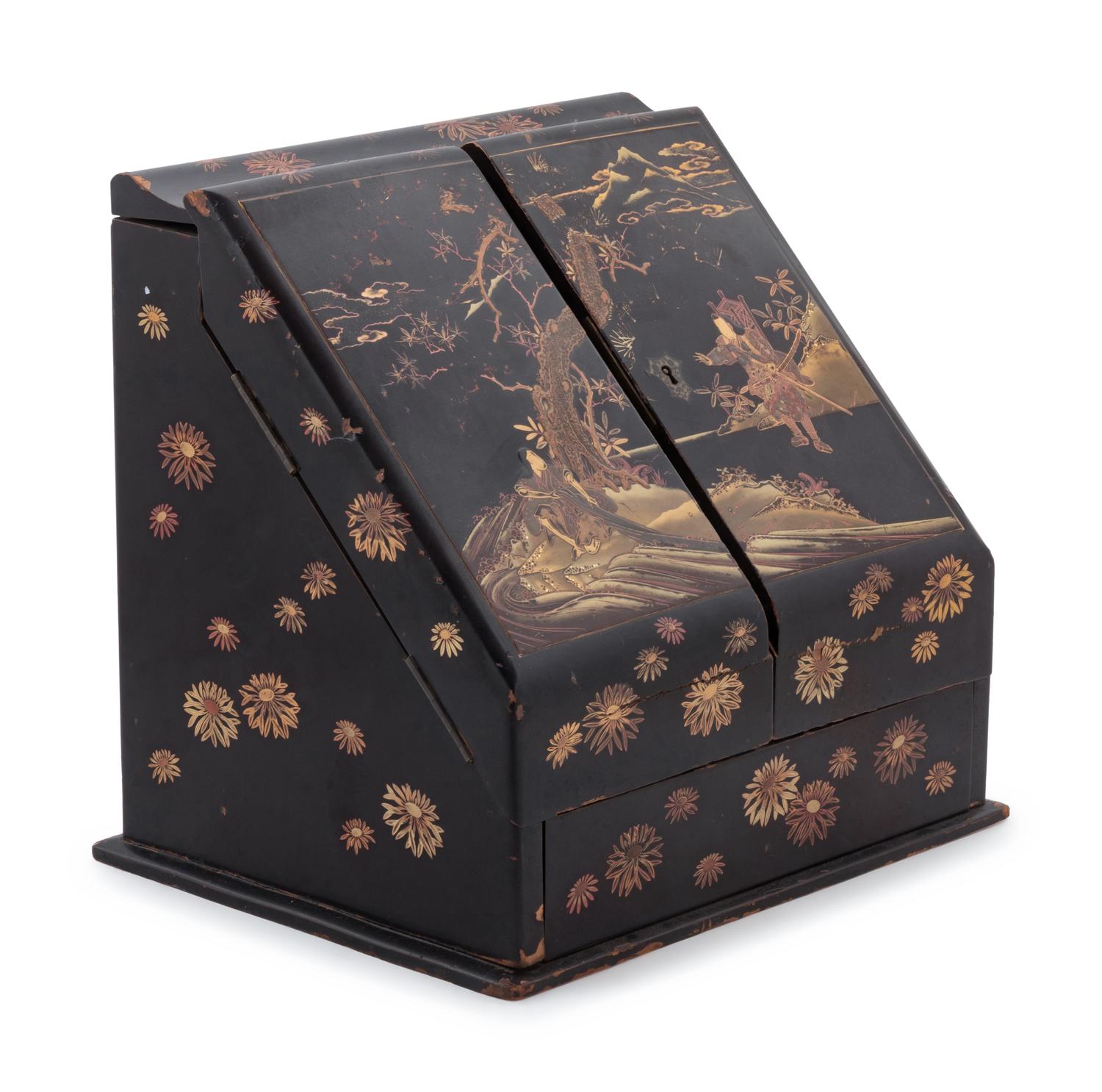 A Japanese Gilt, Black and Red Lacquered Stationary Chest