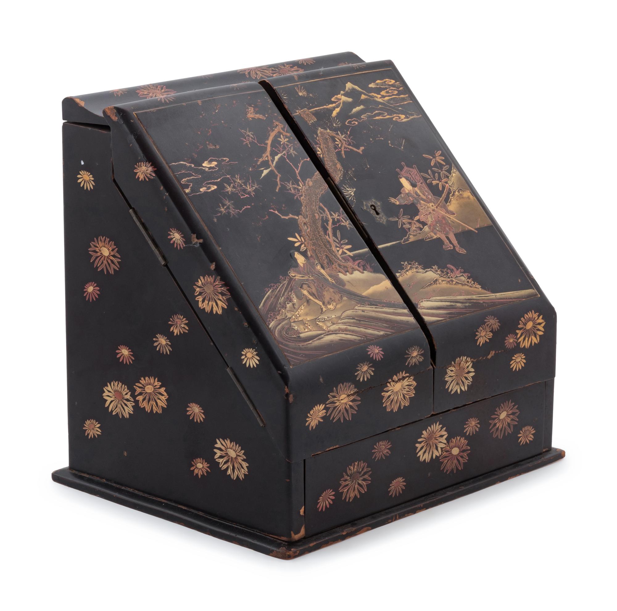 A Japanese Gilt, Black and Red Lacquered Stationary Chest
