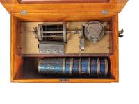 A Capitol B Cuff Music Box with Table, by F.G. Otto & Son