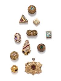 A Gold, Mixed Metal, Gemstone, and Synthetic Gemstone Charm Necklace,