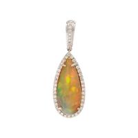 WHITE GOLD, OPAL, AND DIAMOND PENDANT