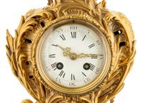 A Louis XV Style Gilt Bronze Mantel Clock
