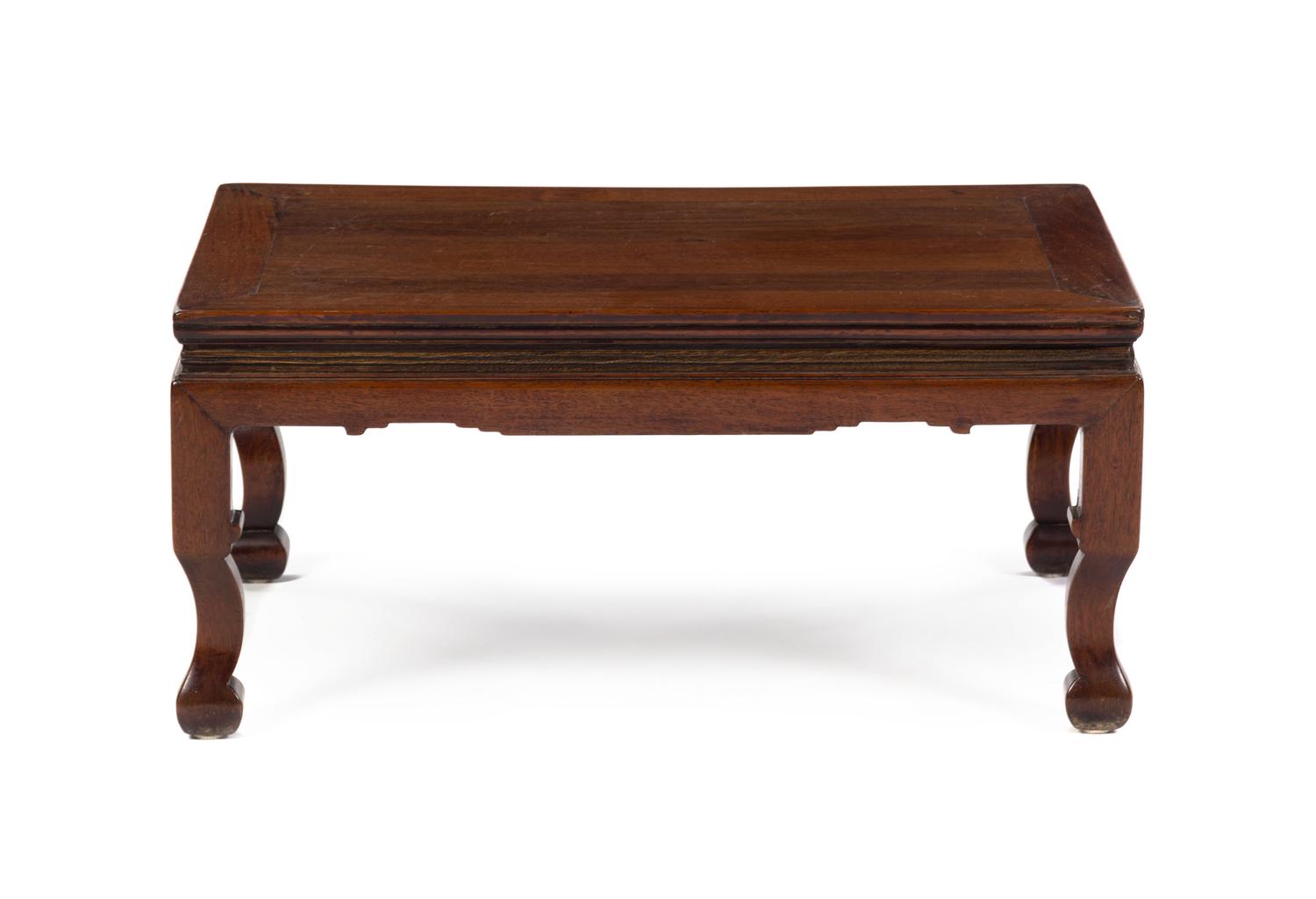 A Chinese Hardwood Kang Table 18TH/19TH CENTURY Height 12 1/2 x width 27 x depth 17 inches. — 18TH/19TH CENTURY