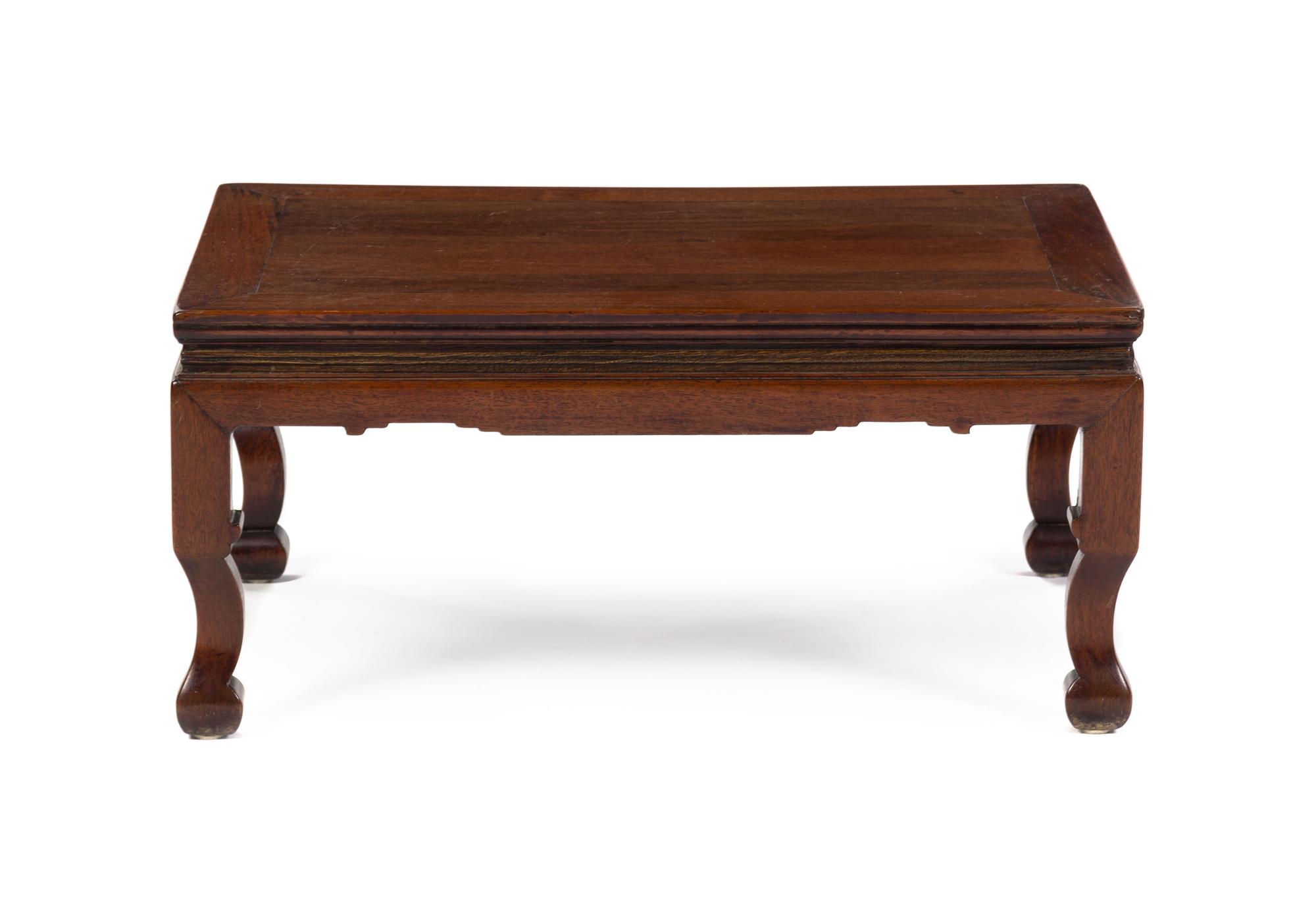A Chinese Hardwood Kang Table 18TH/19TH CENTURY Height 12 1/2 x width 27 x depth 17 inches. — 18TH/19TH CENTURY