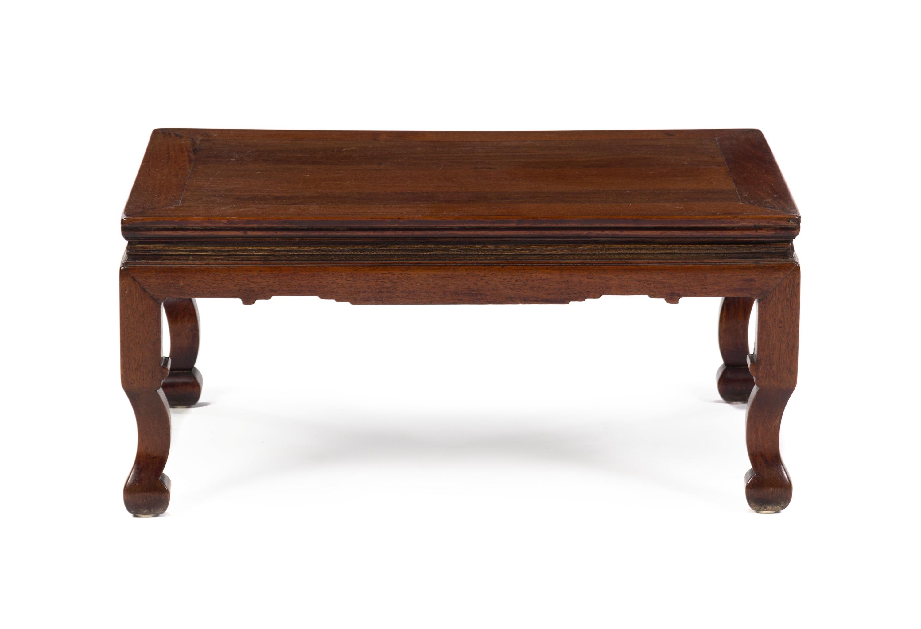 A Chinese Hardwood Kang Table 18TH/19TH CENTURY Height 12 1/2 x width 27 x depth 17 inches. — 18TH/19TH CENTURY
