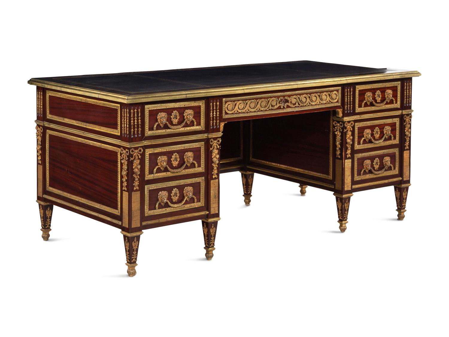 A Louis XVI Style Gilt Bronze Mounted Mahogany Pedestal Desk