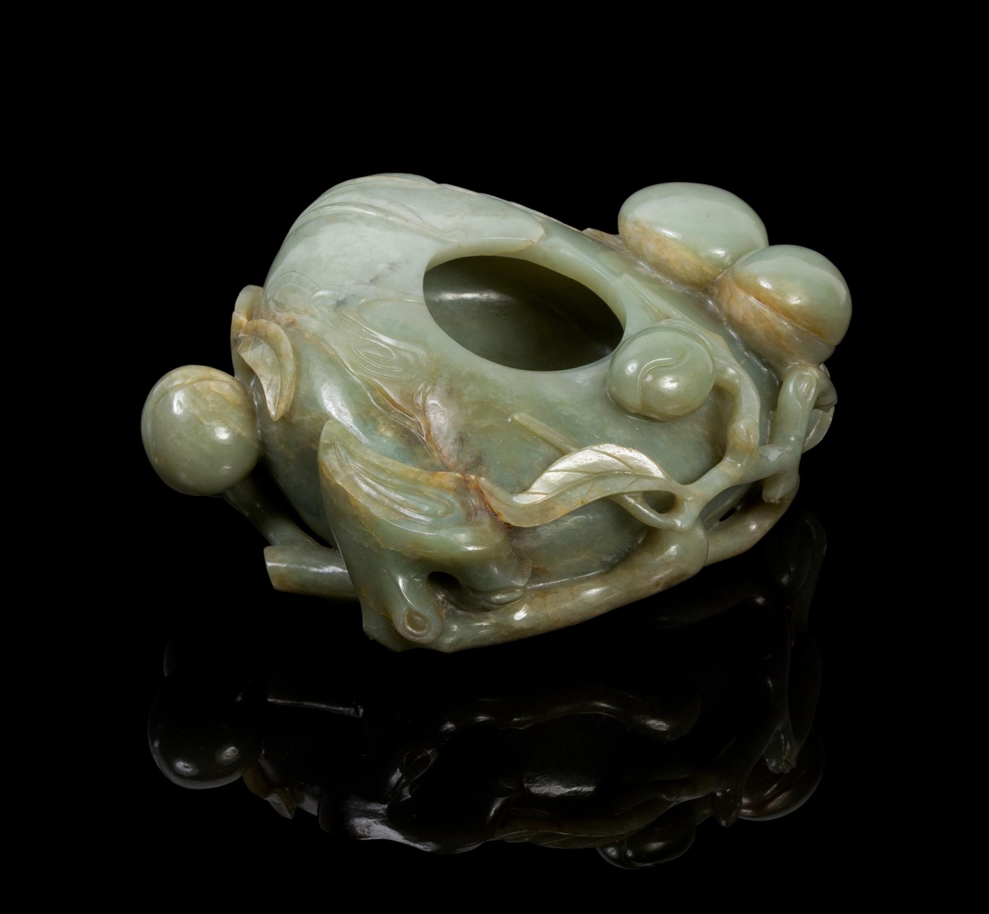 A Chinese Jade Peach Form Water Pot 18TH/19TH CENTURY Length 7 1/2 inches. — 18TH/19TH CENTURY