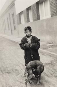 Sergio Larrain (1931-2012) Boy and Dog on Street, 1957