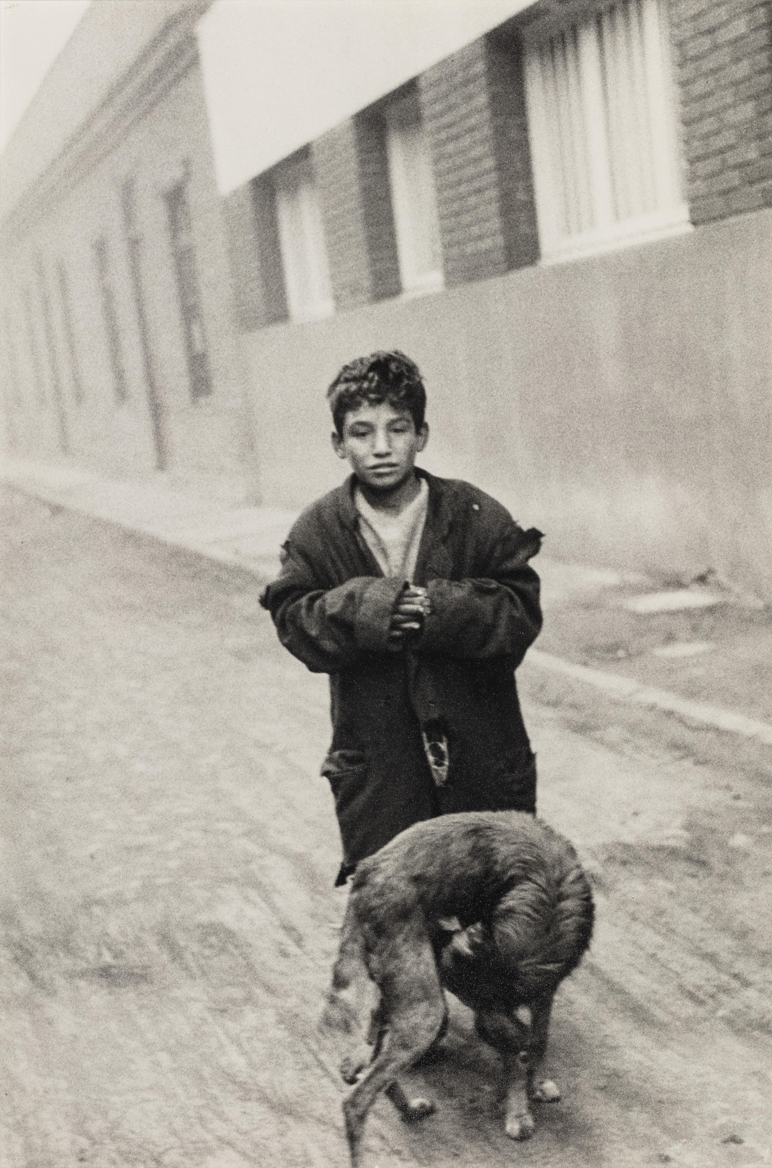 Sergio Larrain (1931-2012) Boy and Dog on Street, 1957