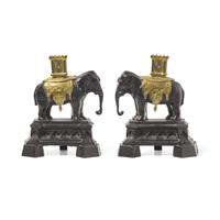 A Pair of French Patinated and Gilt Bronze Elephant-Form Chenets