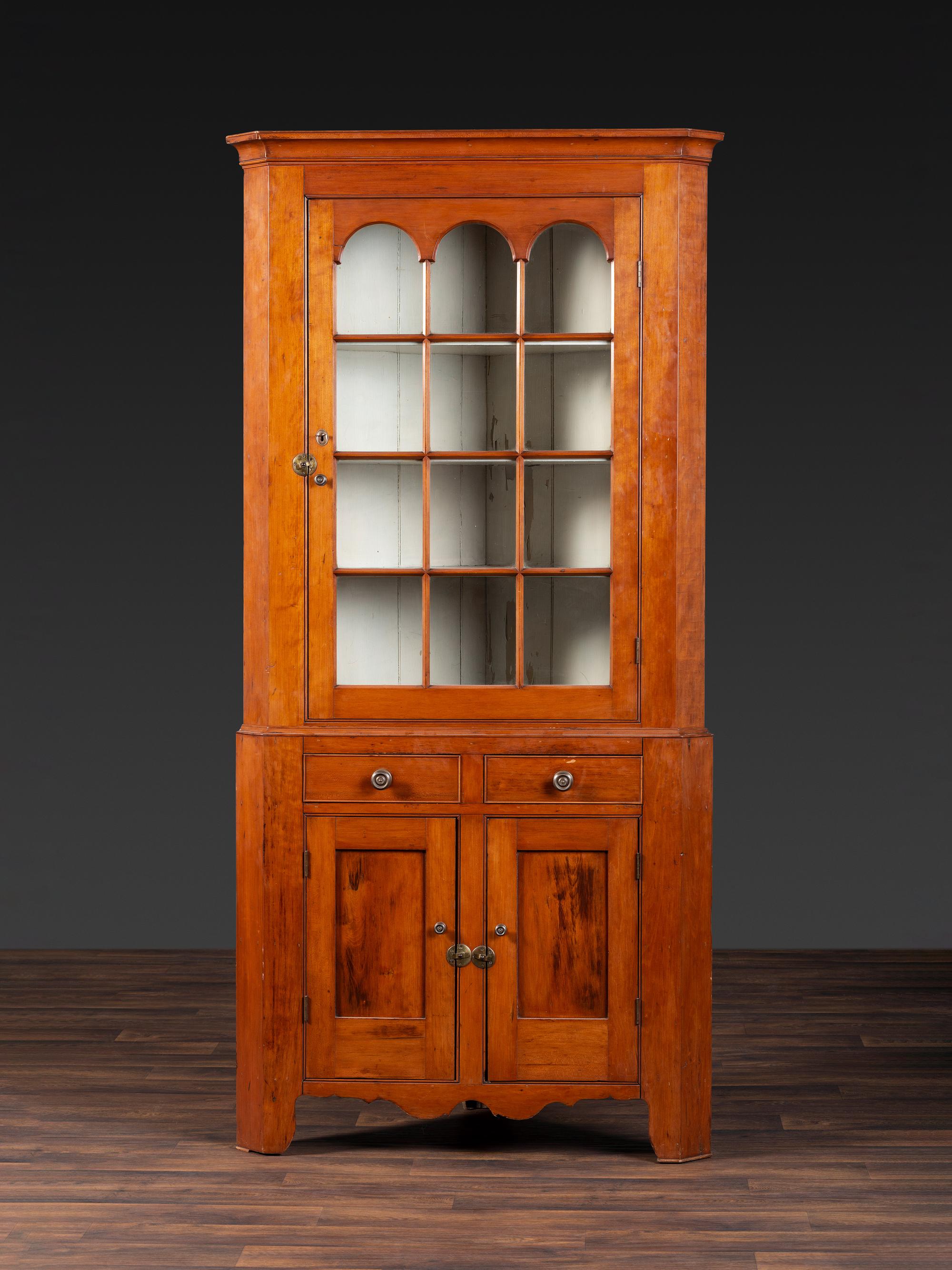 A Federal Cherrywood Corner Cupboard