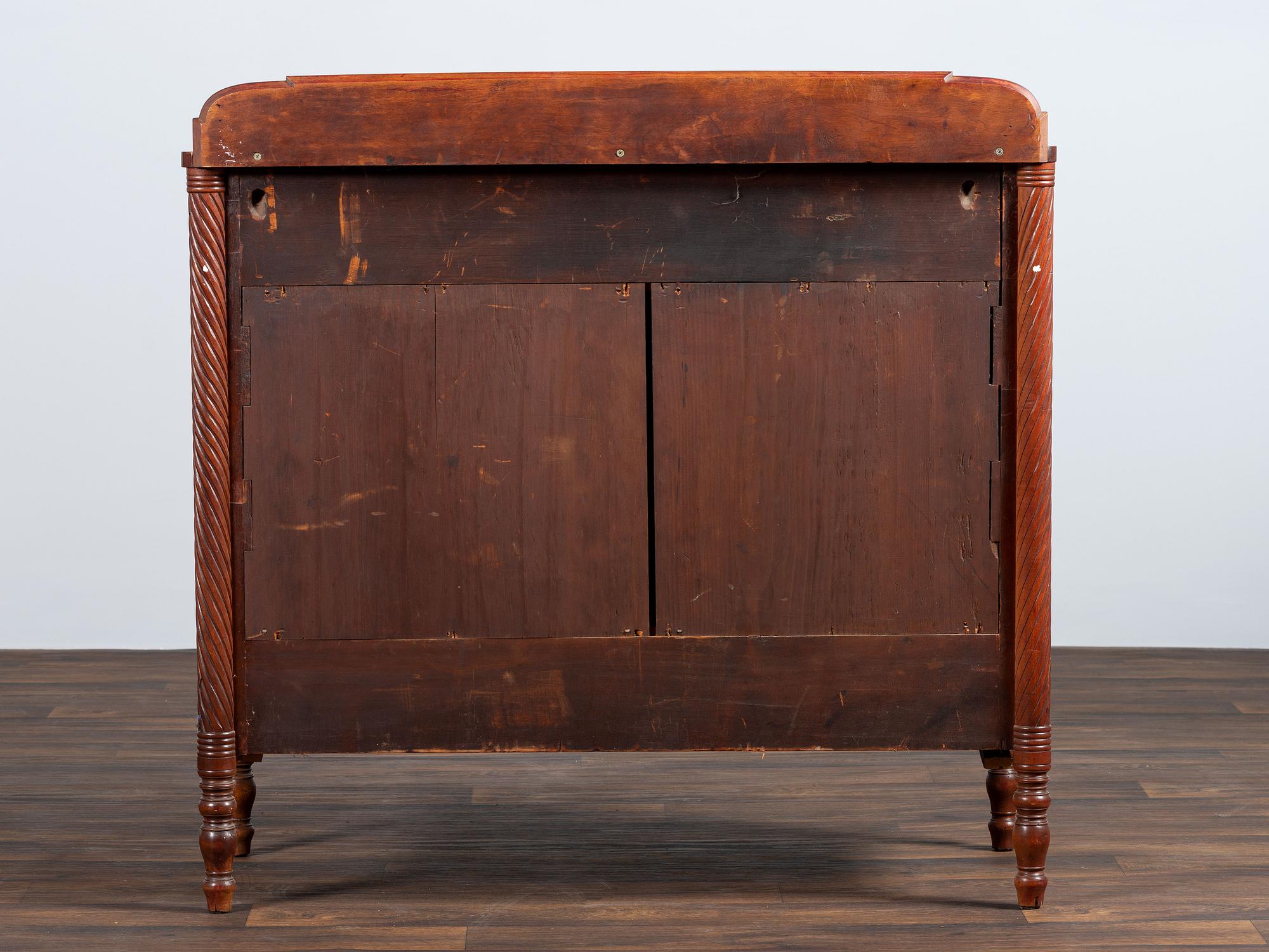 A Federal Bird's-Eye Maple and Mahogany Chest of Drawers