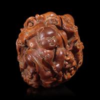 A Chinese Carved Luohan Walnut, 19th/Early 20th Century — 晚清/民國 羅漢圖文玩核桃