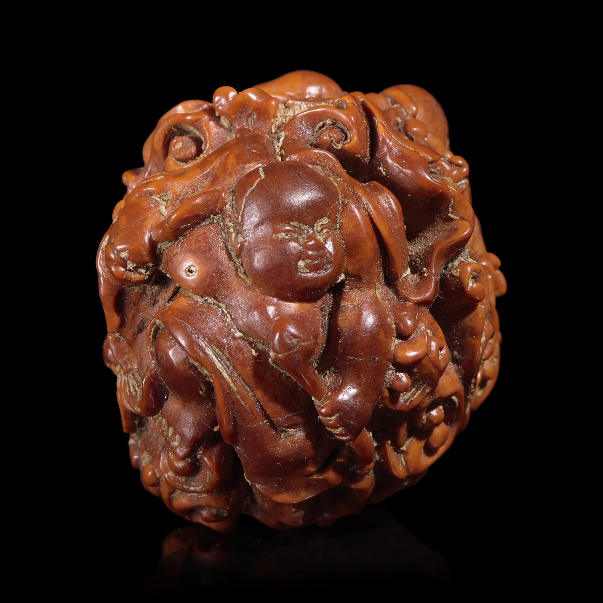 A Chinese Carved Luohan Walnut, 19th/Early 20th Century — 晚清/民國 羅漢圖文玩核桃