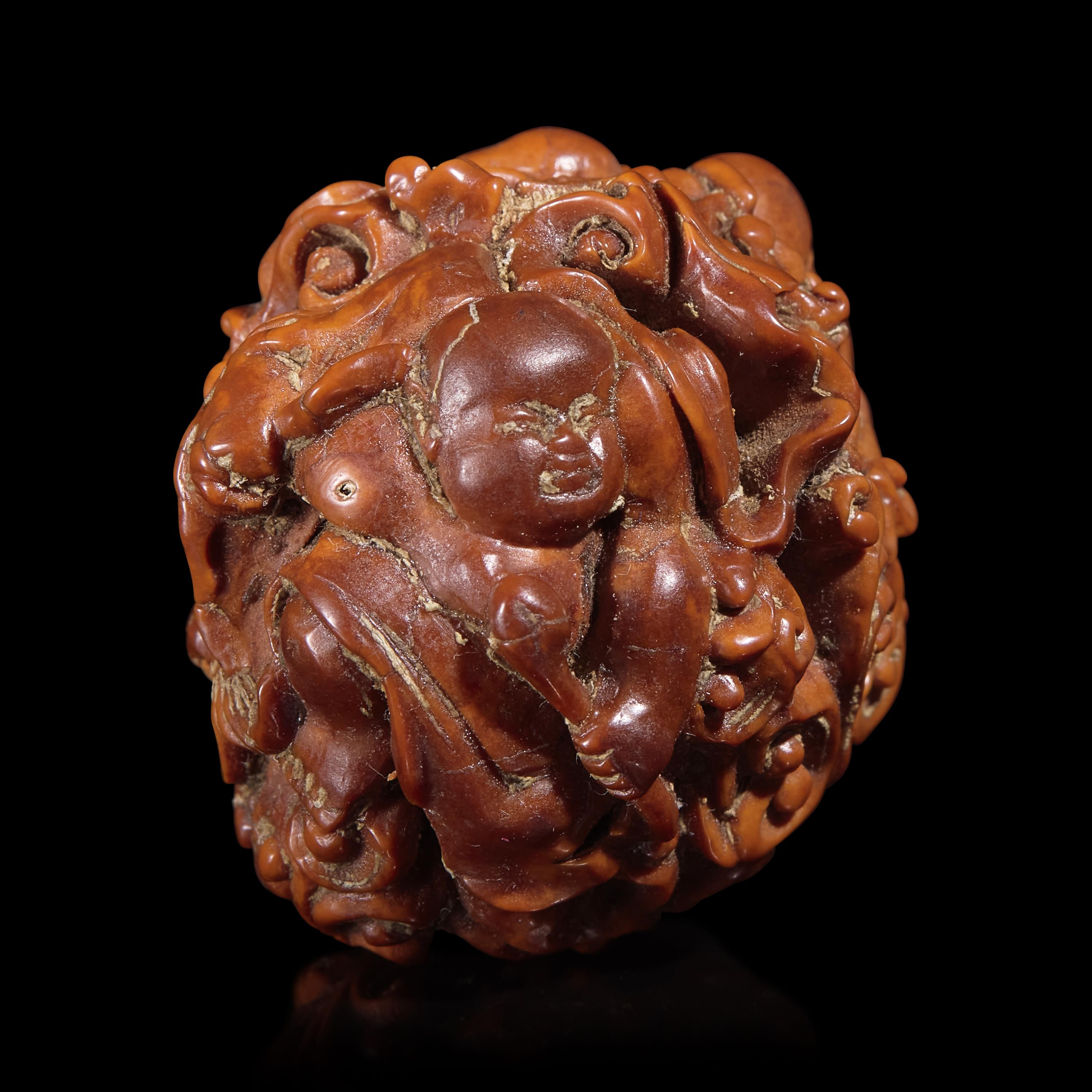 A Chinese Carved Luohan Walnut, 19th/Early 20th Century — 晚清/民國 羅漢圖文玩核桃