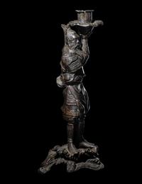 A Japanese Bronze Figural-Form Candle Holder