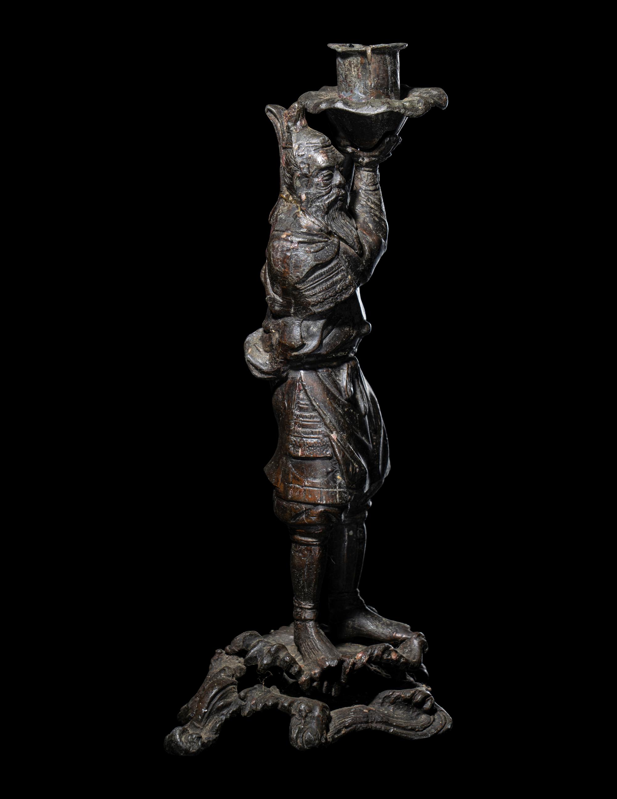A Japanese Bronze Figural-Form Candle Holder