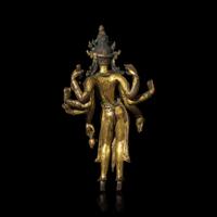 A Nepalese Gilt Bronze Standing Figure of Avalokiteshvara, 14th/15th Century 十四/十五世紀 尼泊爾銅鎏金菩薩立像