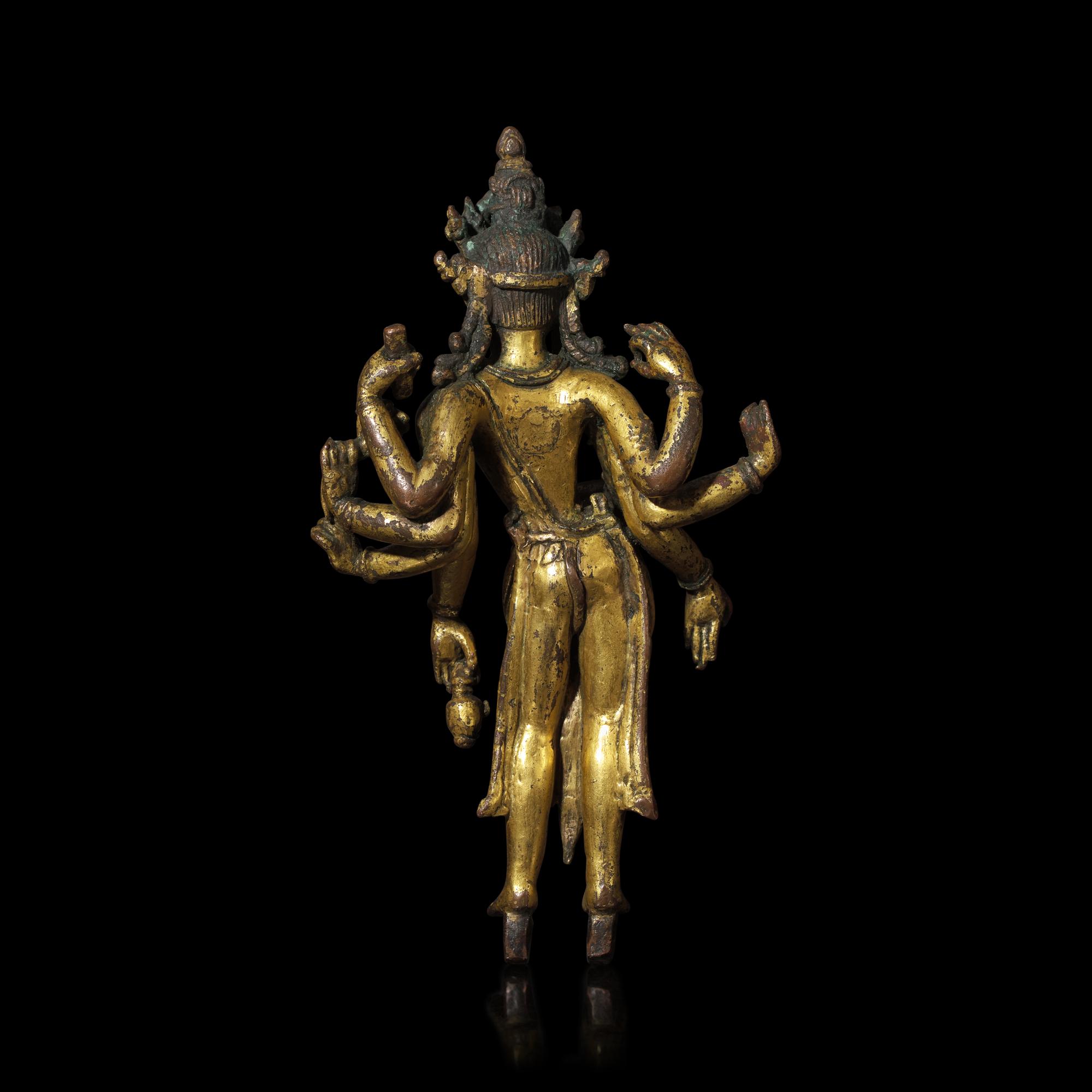 A Nepalese Gilt Bronze Standing Figure of Avalokiteshvara, 14th/15th Century 十四/十五世紀 尼泊爾銅鎏金菩薩立像