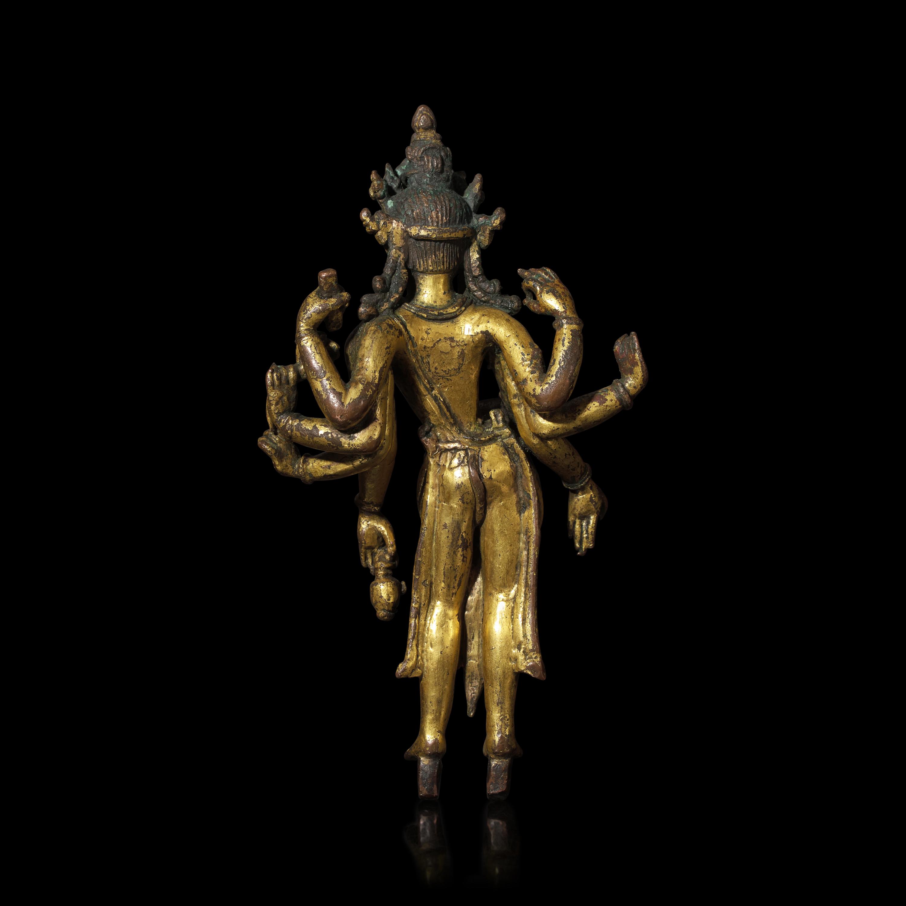 A Nepalese Gilt Bronze Standing Figure of Avalokiteshvara, 14th/15th Century 十四/十五世紀 尼泊爾銅鎏金菩薩立像