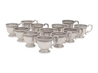 A Group of American Silver Cups and Saucers