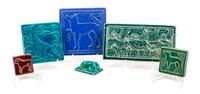 Six Glazed Tiles depicting Stylized Dogs Width of widest 11 inches.