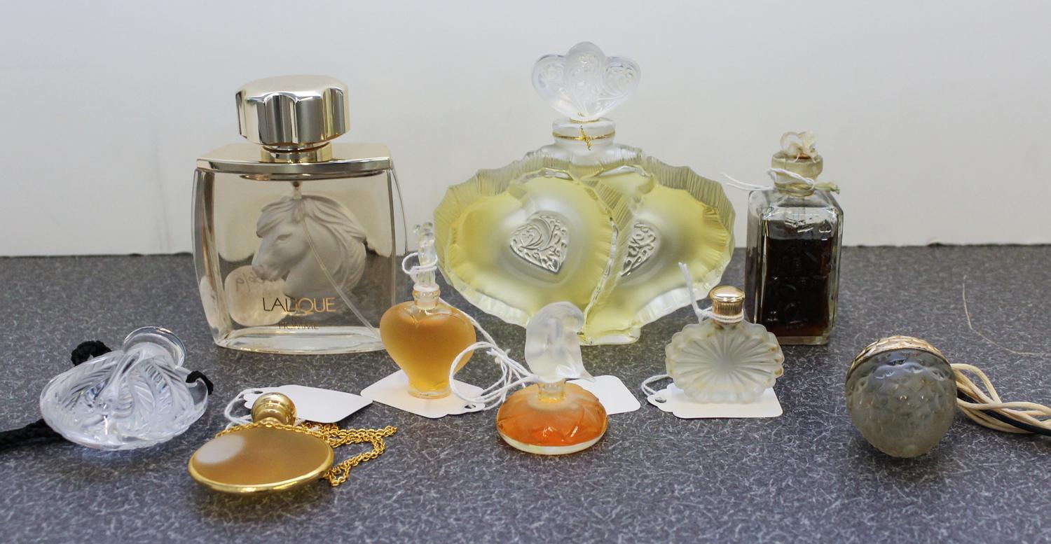 Nine Lalique and Other Perfume Bottles. Height of tallest 4 inches.