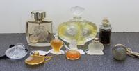 Nine Lalique and Other Perfume Bottles. Height of tallest 4 inches.