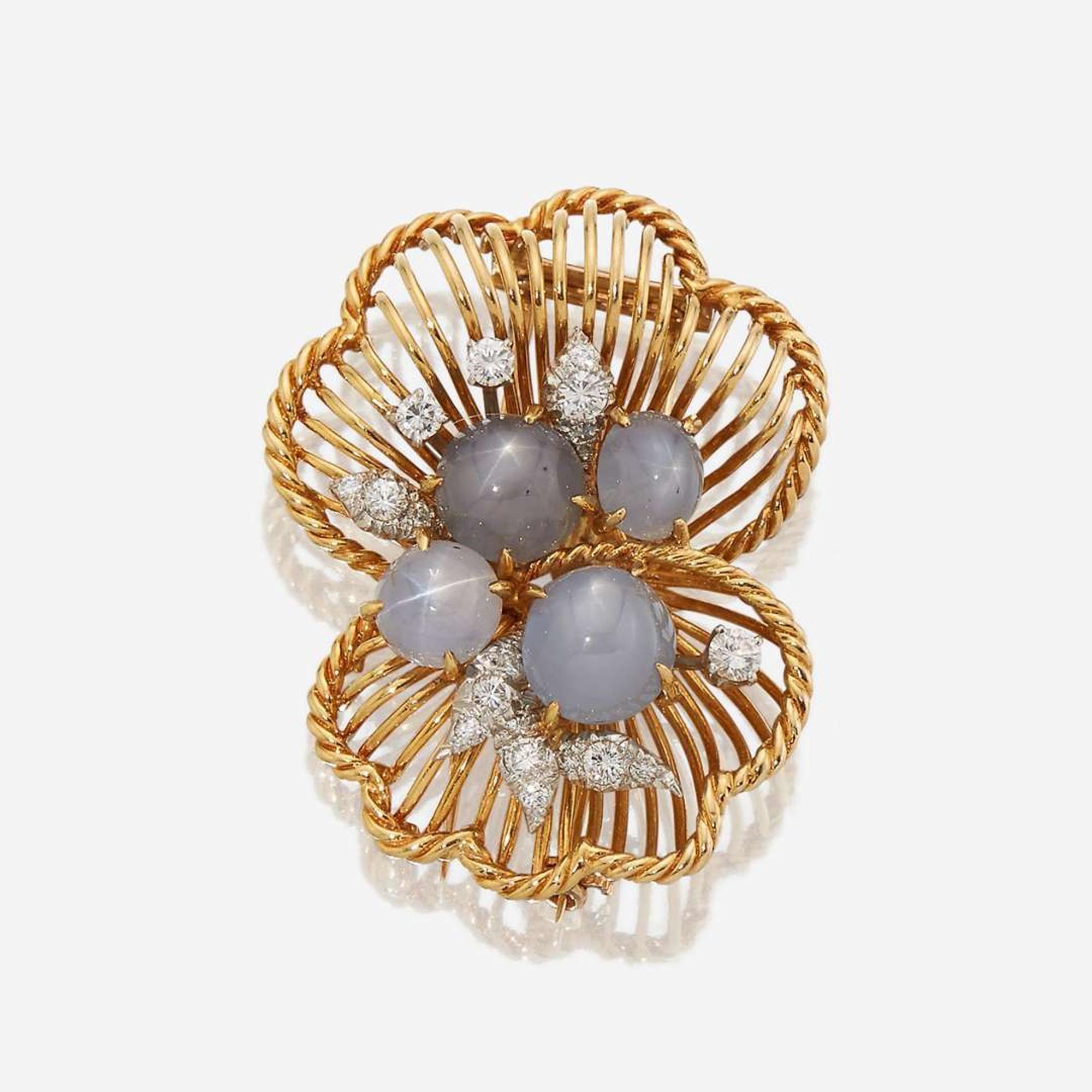 A star sapphire, diamond, and eighteen karat gold brooch