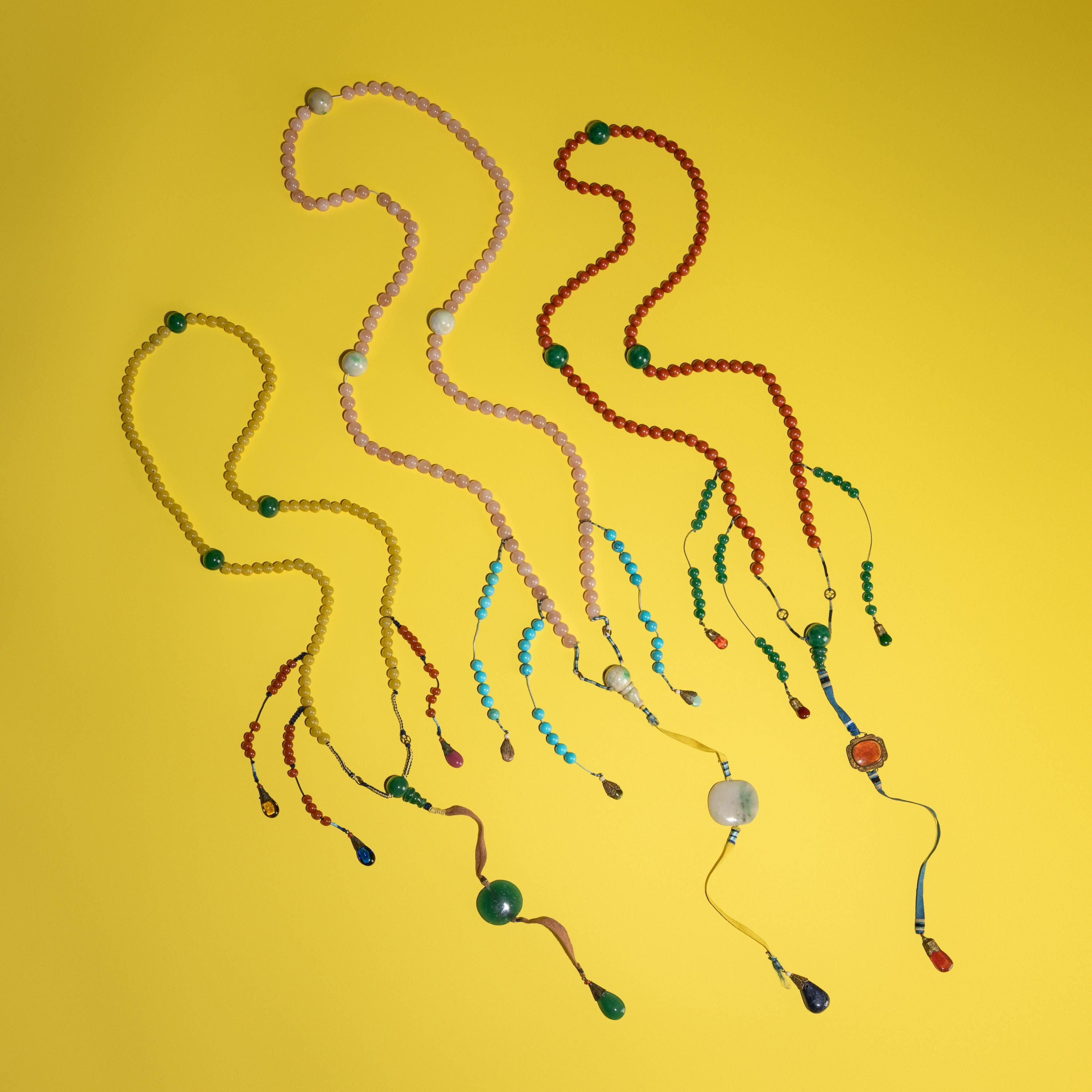 Three Chinese Court Necklaces, Chaozhu, Late 19th-Early 20th Century — 清晚期 水晶、料器朝珠三挂
