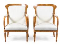 A Pair of Biedermeier Ash and Amaranth Armchairs Height 34 inches. — CIRCA 1825