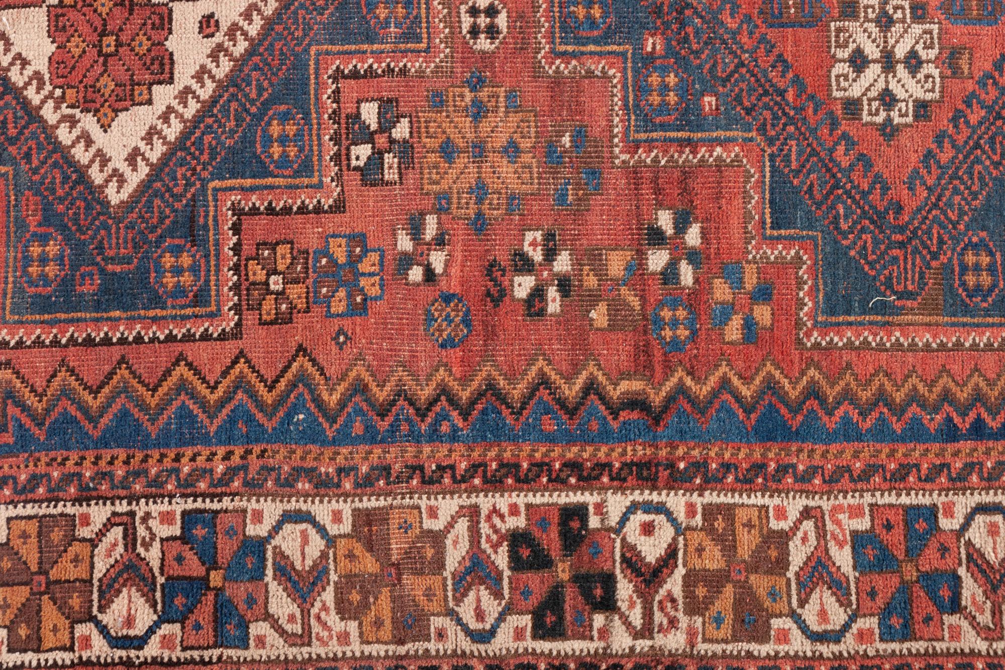 Three Persian Rugs