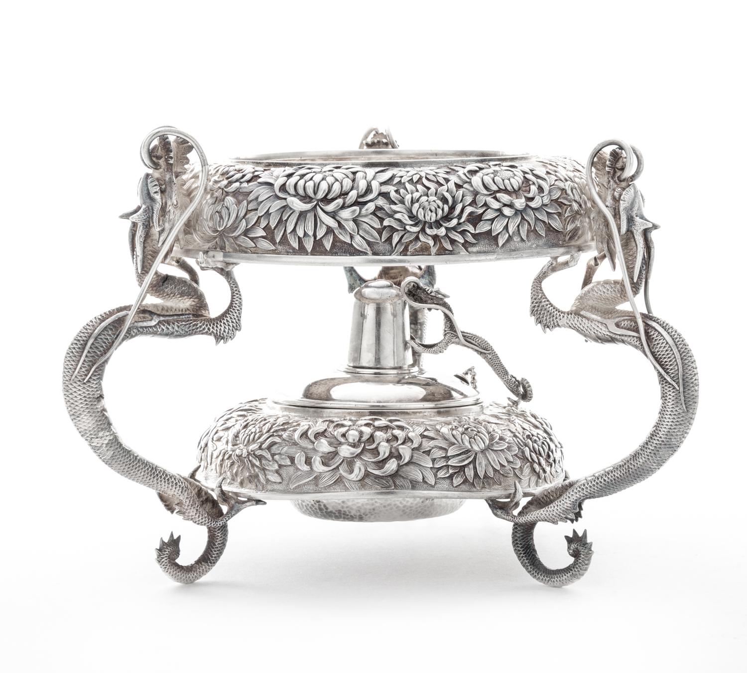 A Japanese Silver Water Kettle Stand, Y. Konoike, Yokohama, Meiji Period, the kettle stand worked to show repousse chrysanthemum decora