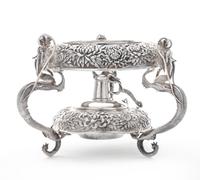 A Japanese Silver Water Kettle Stand, Y. Konoike, Yokohama, Meiji Period, the kettle stand worked to show repousse chrysanthemum decora