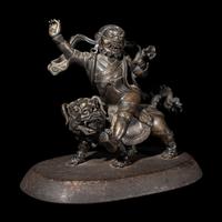 A Sino-Tibetan Bronze Figure of a Guardian