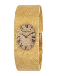 BUECHE GIROD, YELLOW GOLD WATCH