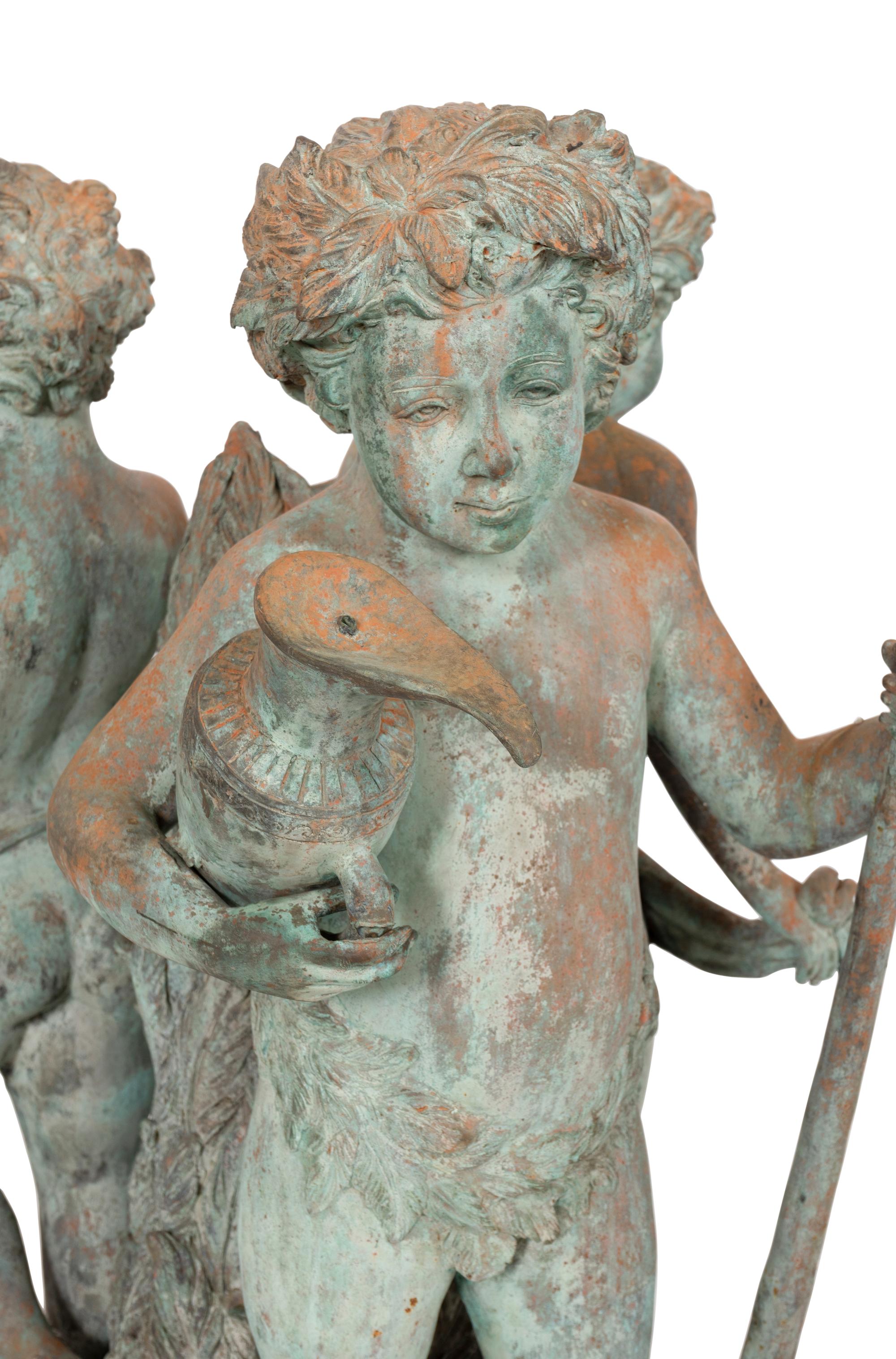 A Large Continental Patinated Bronze Putti Fountain