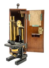 An English Brass and Black Lacquered Microscope Height 11 inches. — W. WATSON & SONS, LONDON, EARLY 20TH CENTURY