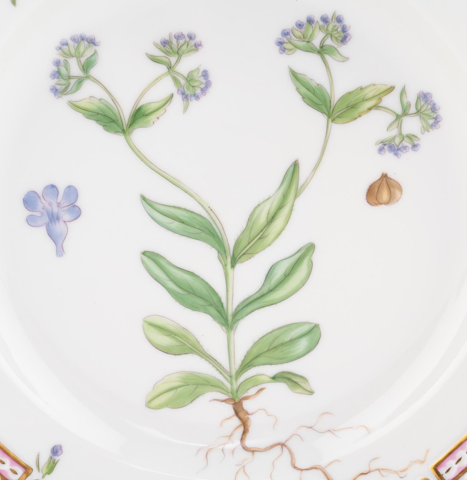 A Set of Eight Royal Copenhagen Flora Danica Porcelain Salad Plates