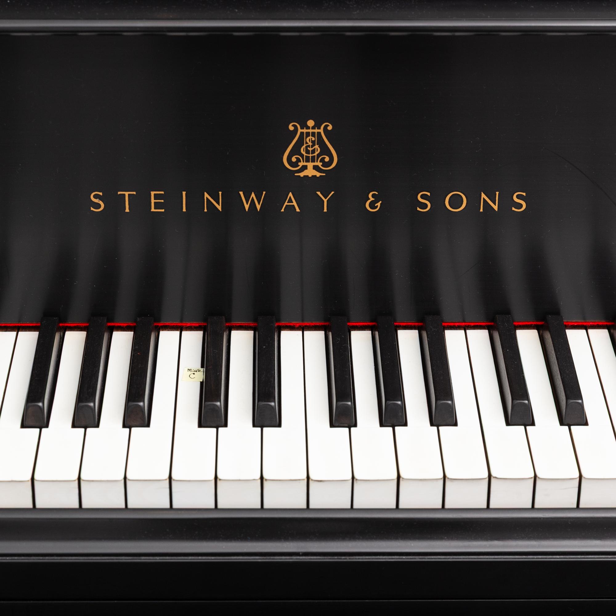 A Steinway and Sons Black Lacquer Grand Piano
