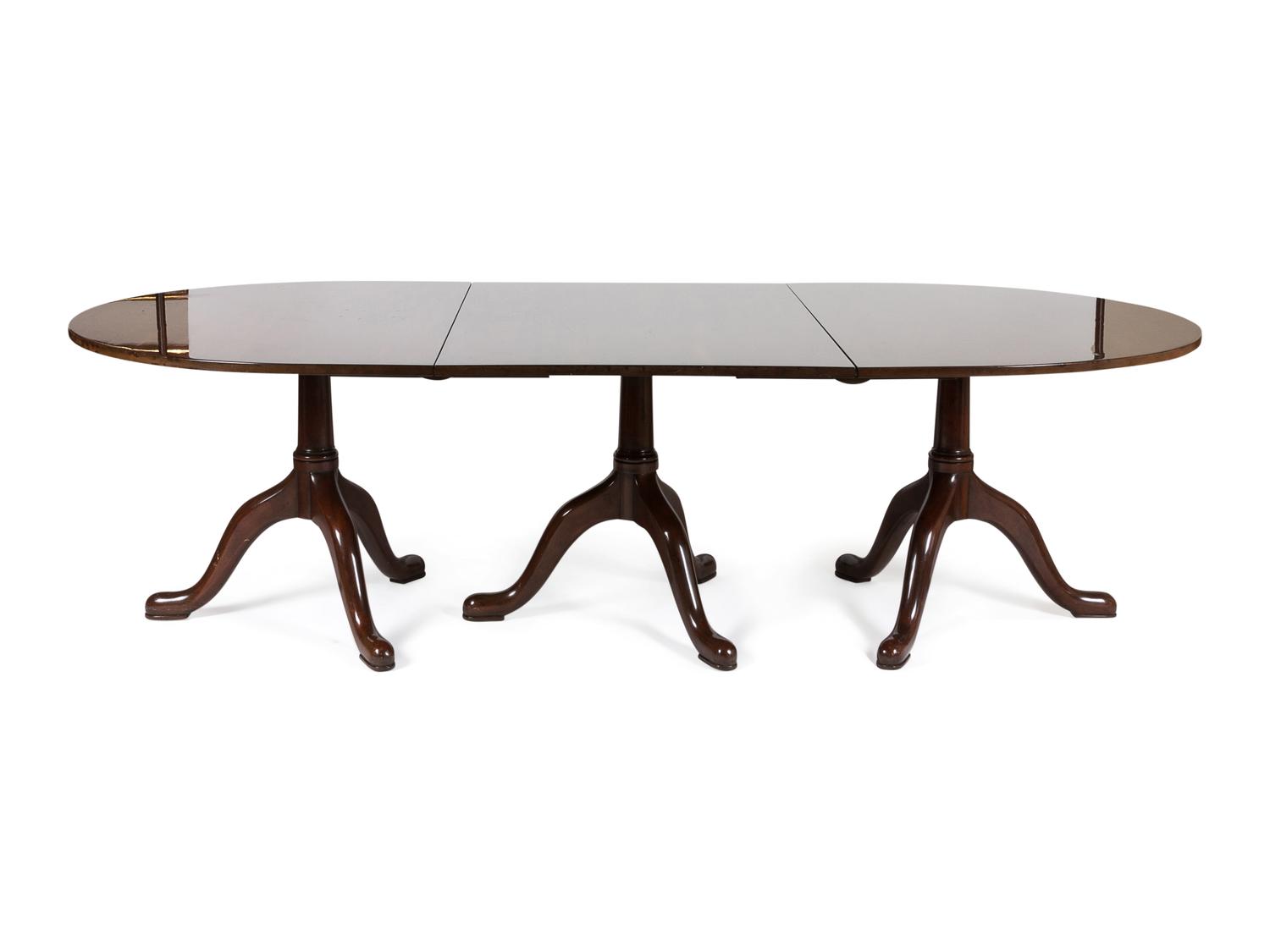 A Georgian Style Three-Pedestal Mahogany Dining Table — KITTINGER, 20TH CENTURY