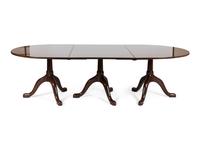 A Georgian Style Three-Pedestal Mahogany Dining Table — KITTINGER, 20TH CENTURY