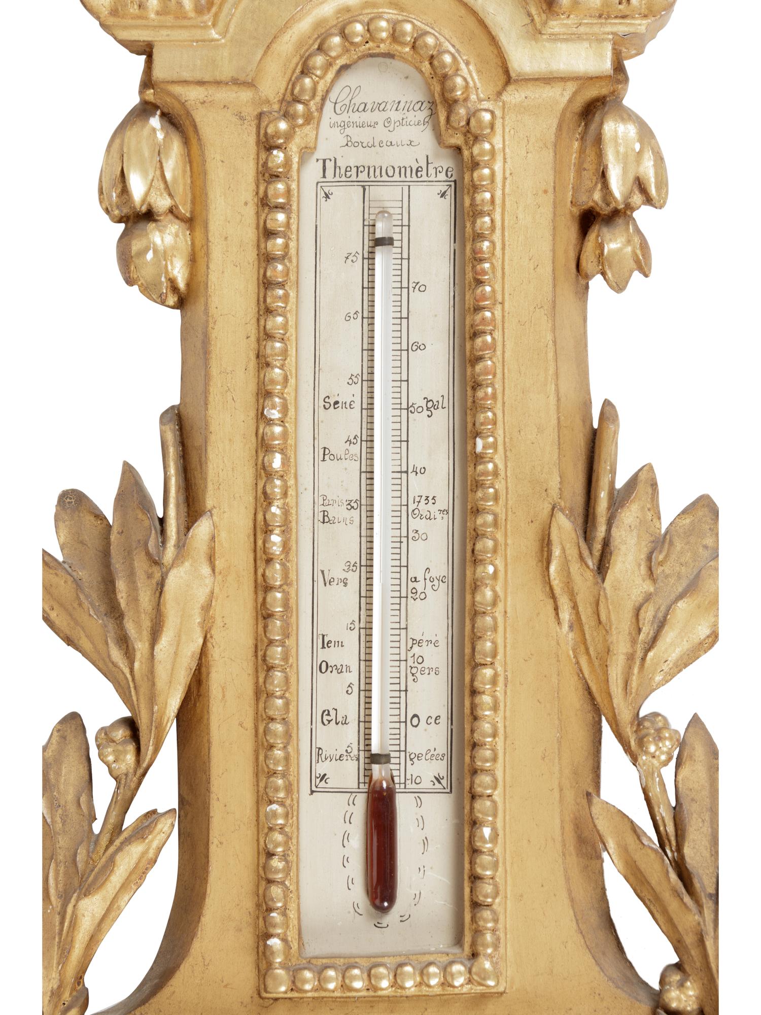 A Louis XV Style Carved Giltwood Barometer and Thermometer