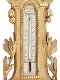 A Louis XV Style Carved Giltwood Barometer and Thermometer