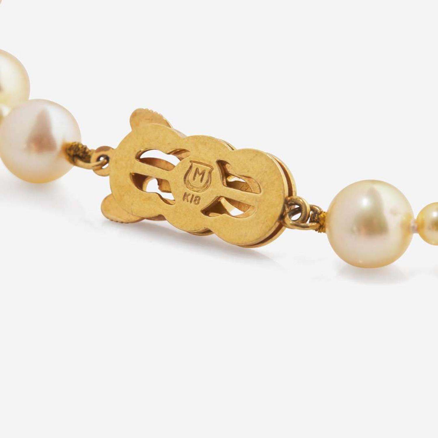 A Pair of 18K Yellow Gold and Pearl Earrings and a Mikimoto Pearl Necklace