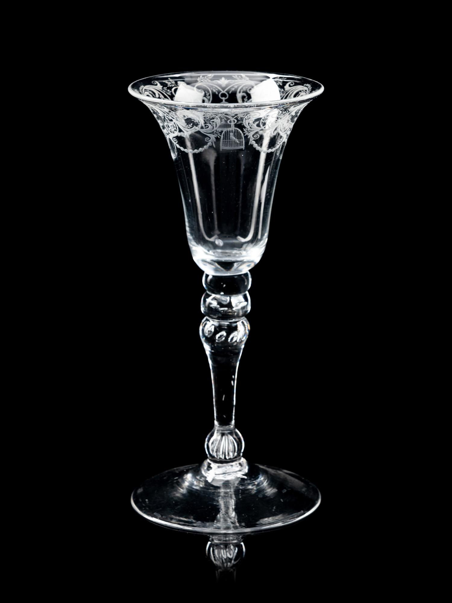A Group of Three Engraved Wine Glasses