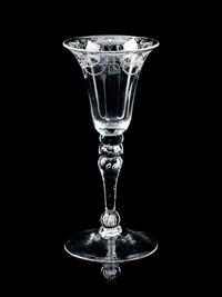 A Group of Three Engraved Wine Glasses