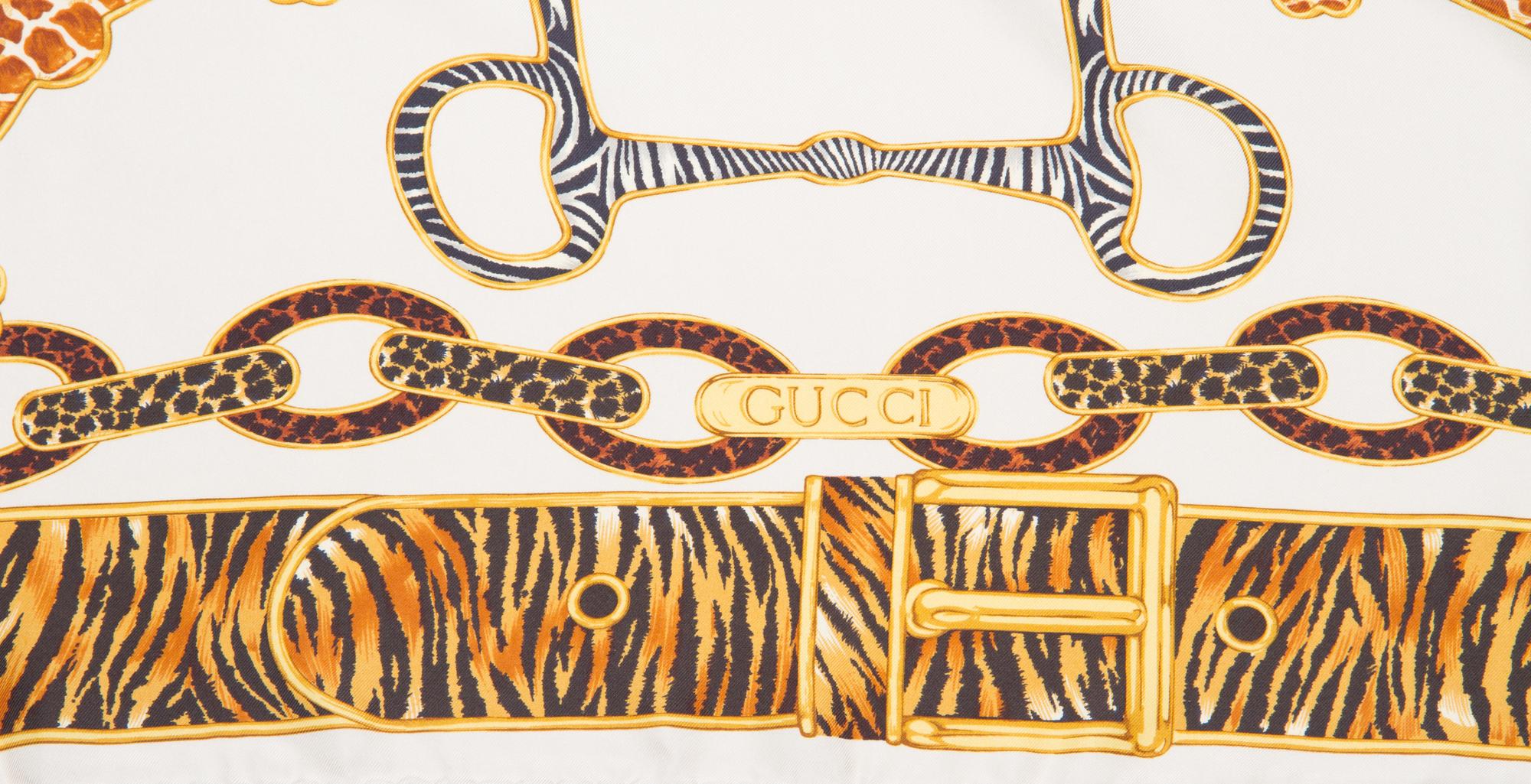 A Pair of Gucci Silk Scarves, 34" x 34".