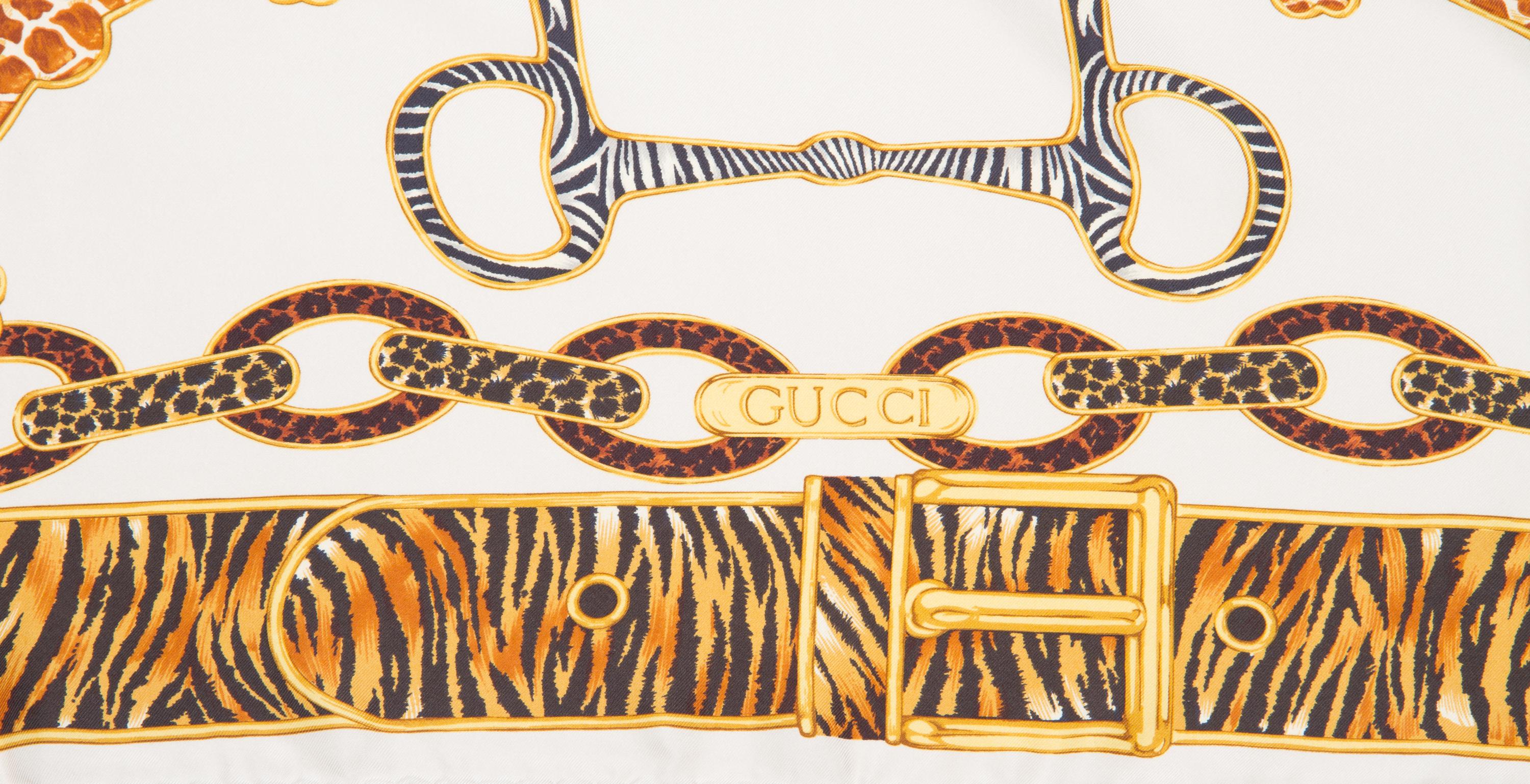 A Pair of Gucci Silk Scarves, 34" x 34".
